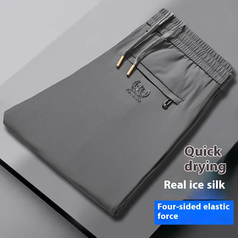 🧊【M-5XL】Letnie cienkie, lodowe, jedwabne, swobodne spodnie męskie