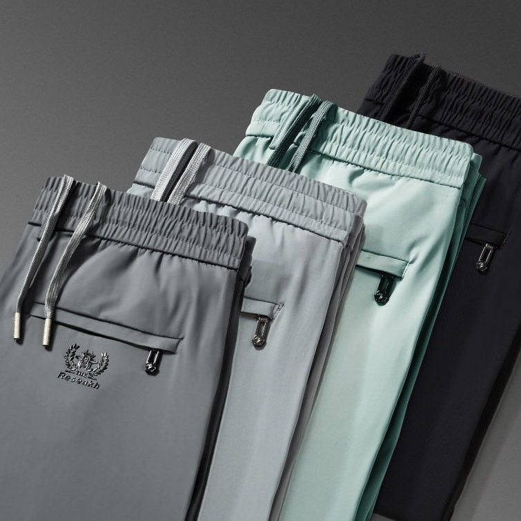 🧊【M-5XL】Letnie cienkie, lodowe, jedwabne, swobodne spodnie męskie