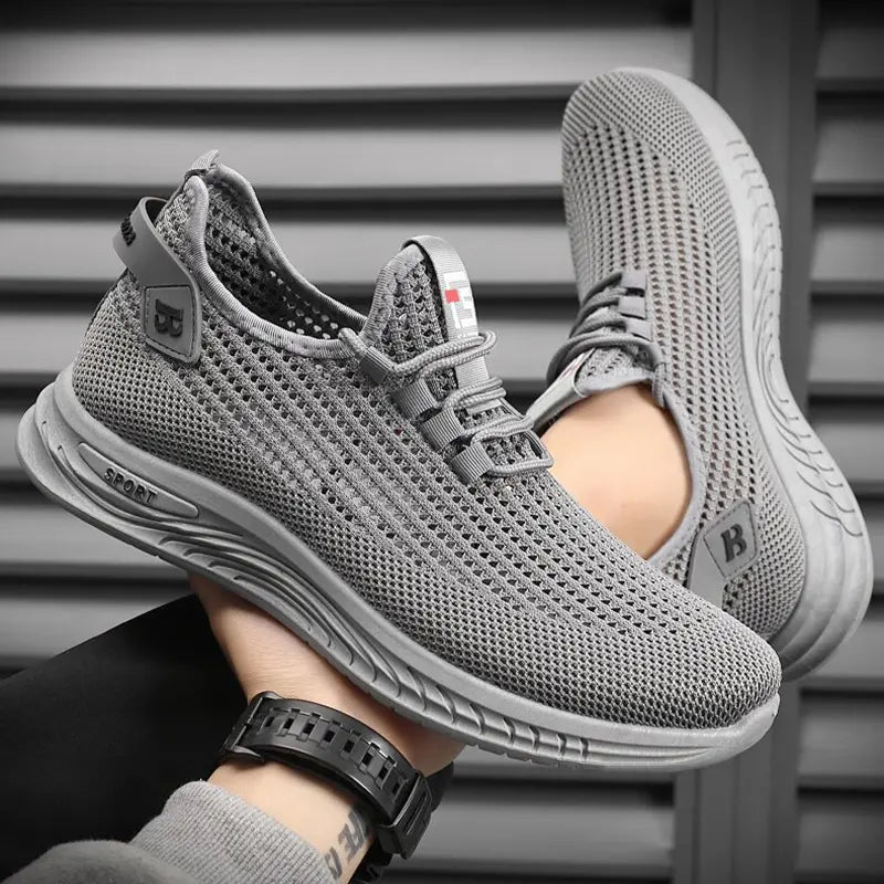 👟【39-44】Kényelmes és légáteresztő hálós, csúszásmentes, divatos alkalmi férfi cipő